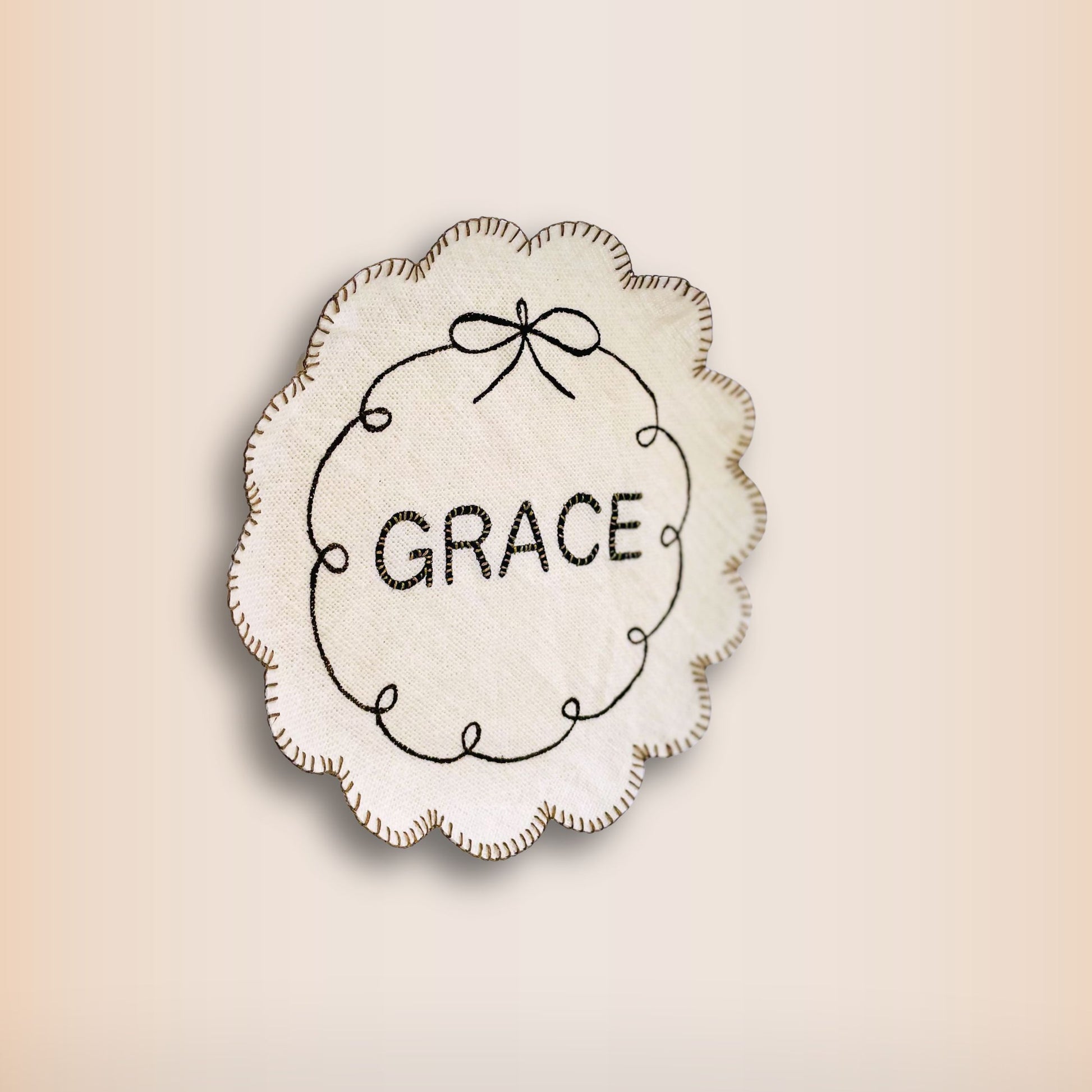 Handmade Grace Fabric Plate with embroidered details, inspired by John 1:16 and created as a meaningful Christian fabric craft project.