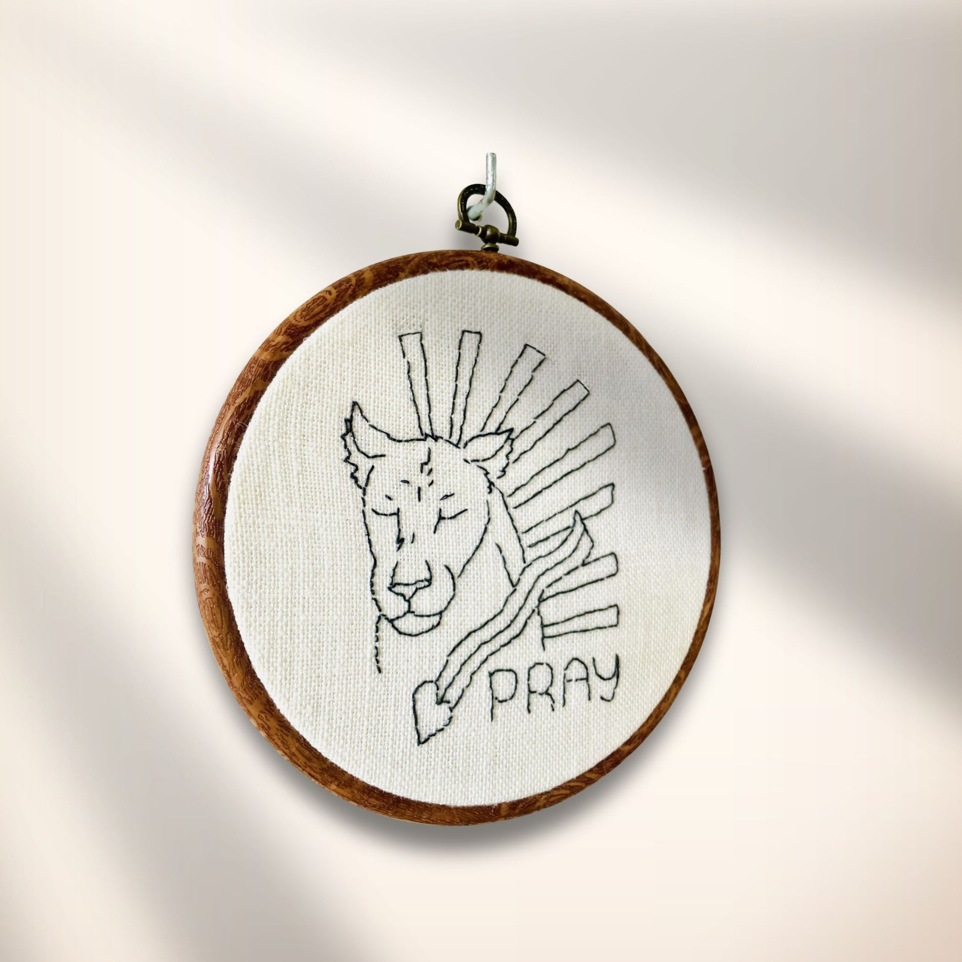 Christian Lioness of Prayer embroidery pattern stitched in a hoop as a Bible-inspired handmade craft project.