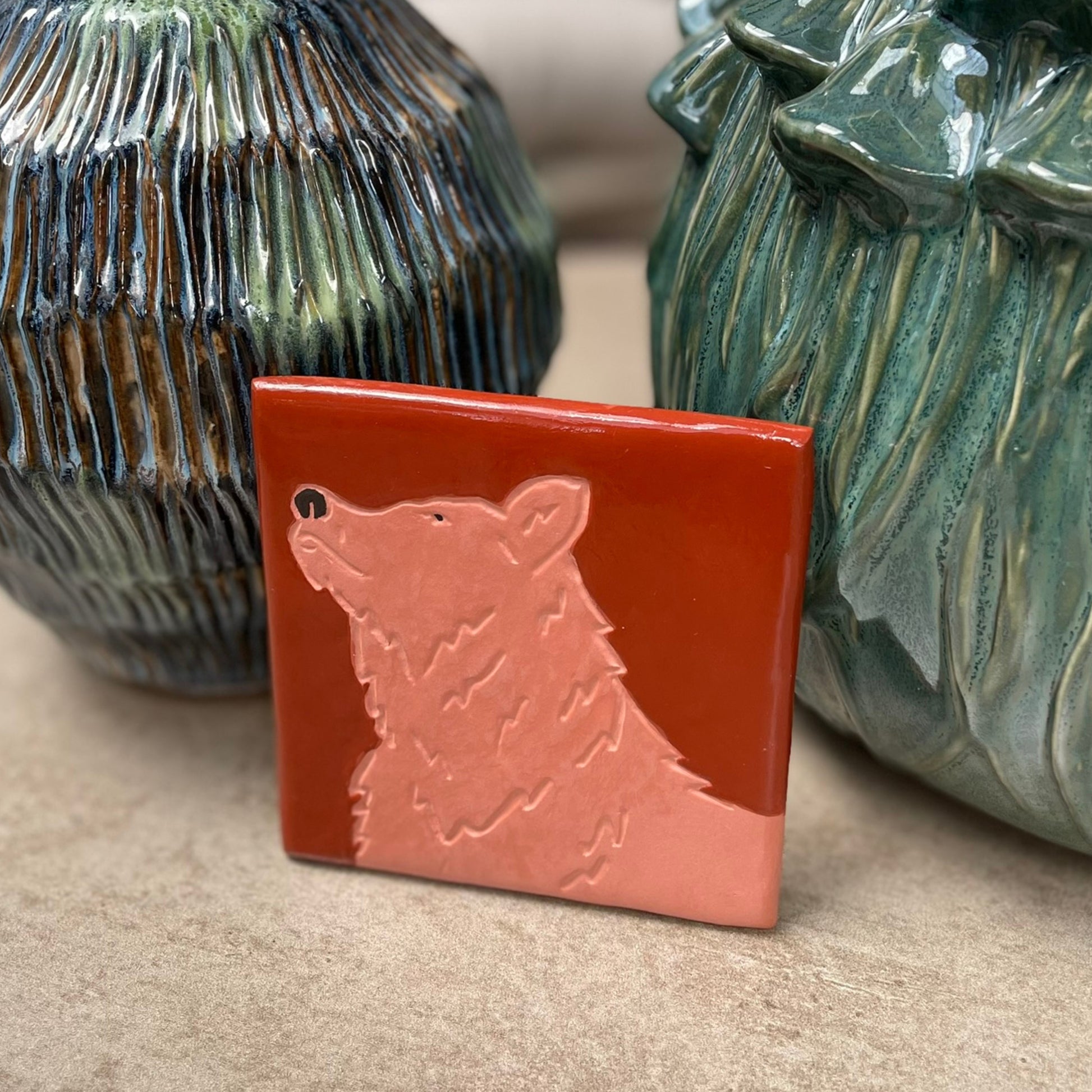 Finished Look Up Bear clay tile displayed as handmade home decor, inspired by Psalm 121 and created as a meaningful Christian craft project.